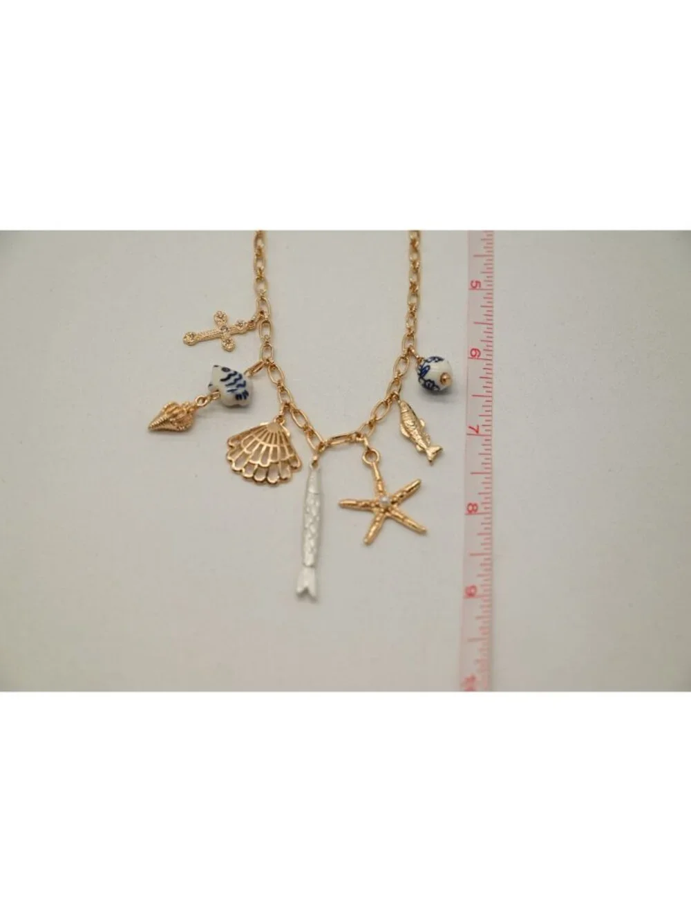NWT Josslyn Gold Tone Charm Necklace Seashell Starfish Fish Pendant Coastal Boho